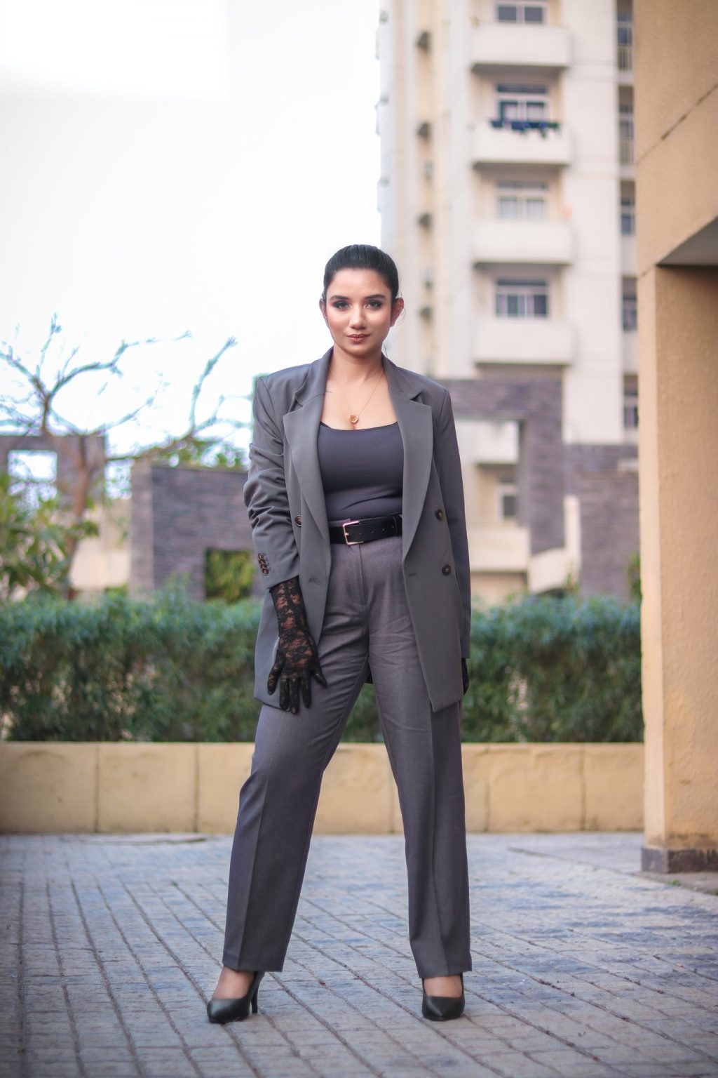 Sakshi Jethwani in a grey tailored suit