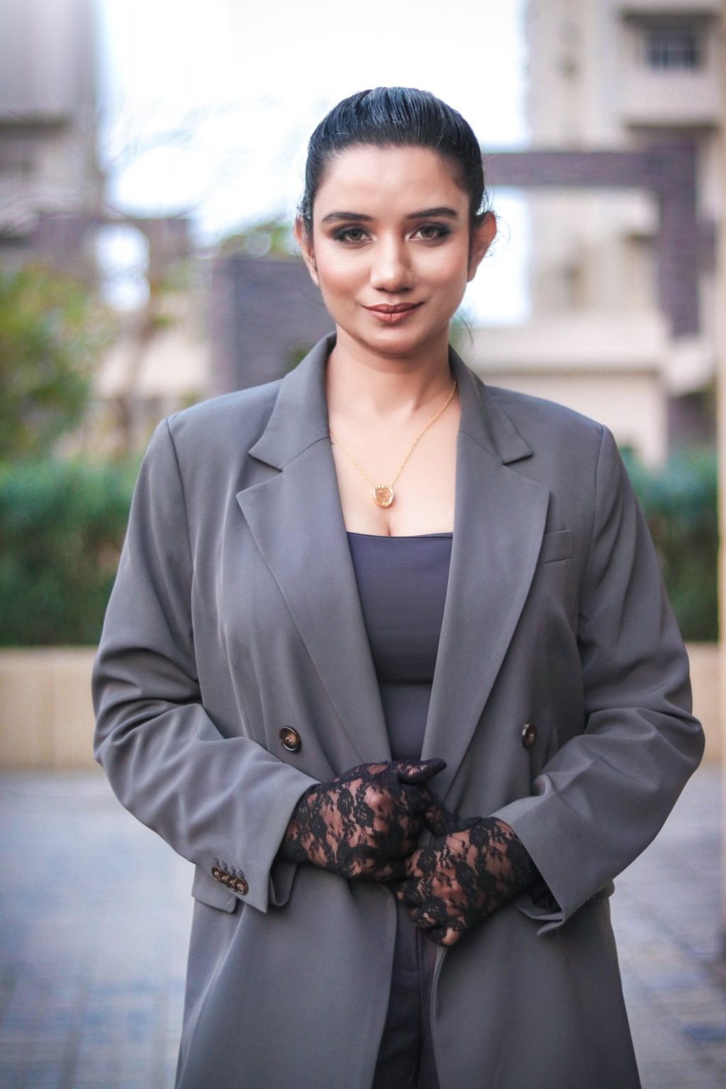 Sakshi Jethwani in a grey oversized blazer