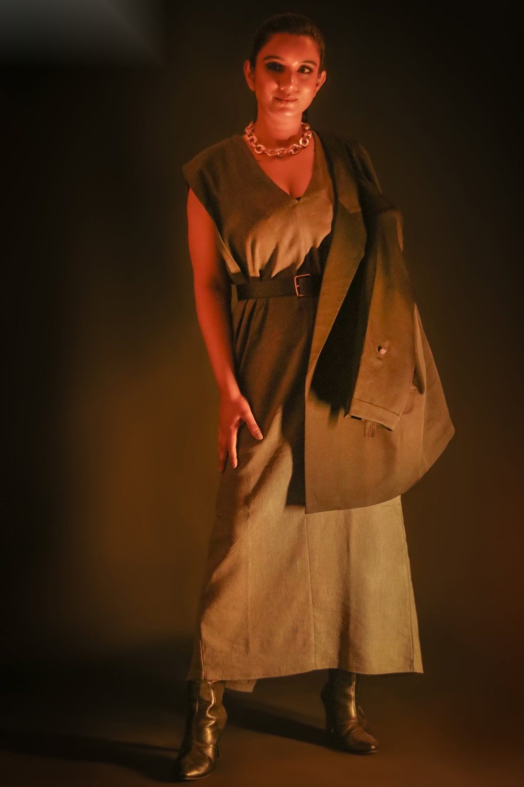 Sakshi Jethwani in a gold outfit
