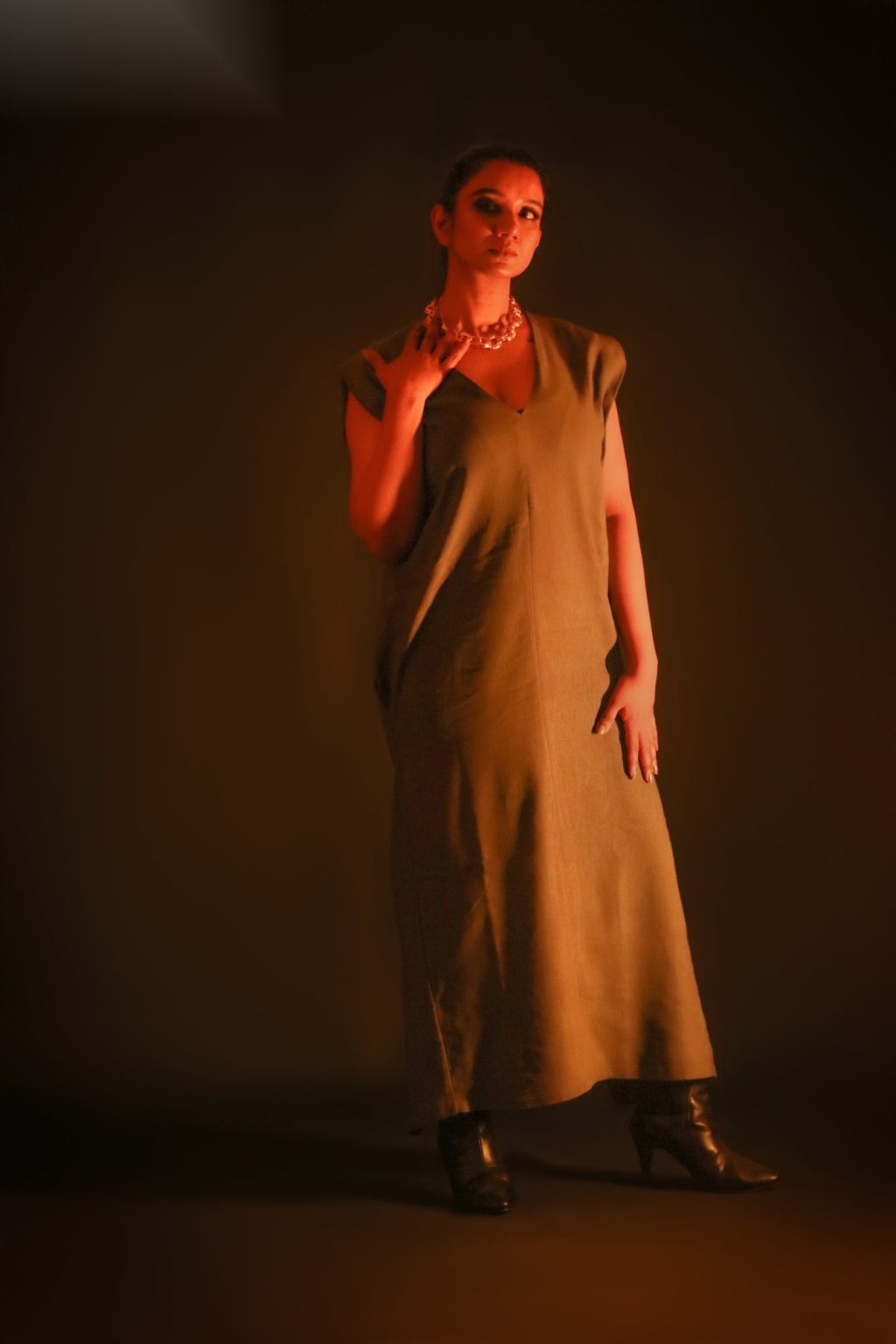 Sakshi Jethwani in a gold draped dress