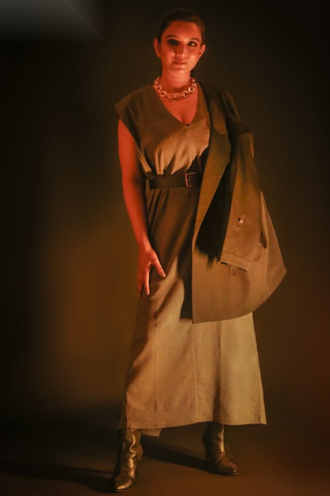 Sakshi Jethwani in a gold outfit